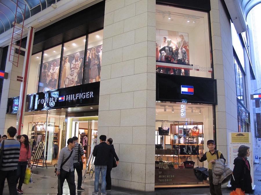 First, locate the Tommy Hilfiger store at Shinsaibashi Suji. Trust us, you won't miss it.